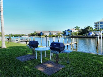 Gas grills out by the boat docks for guest use