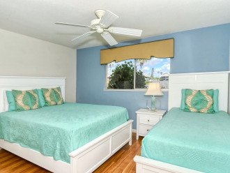Second Bathroom with Queen plus twin-size beds, HDTV, closets, large window overlooking the bay