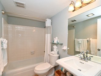 En suite master bathroom with tub/shower combo
