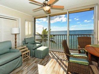 Enclosed, air conditioned lanai has an amazing view of the Gulf and the beach below.