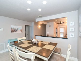 Dining area is right off the kitchen with seating for six