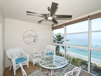 Enclosed, air conditioned lanai has an amazing view of the Gulf and the beach below - spectacular views.