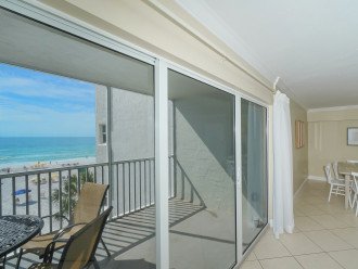 Screened in Lanai with spectacular view of the white crystal sands of world famous Crescent Beach and the blue waters of the Gulf!