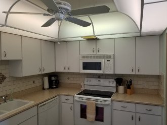 L Shaped Kitchen w California Ceiling, Stove, Microwave, Dishwasher