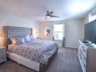 The master suite features a King bed and TV
