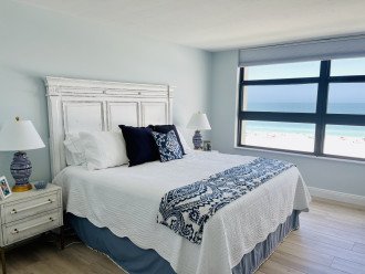 Primary bedroom with king size bed, HDTV