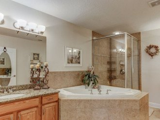 Master Bath with Jetted Tub and separate Shower. Two separate vanities.