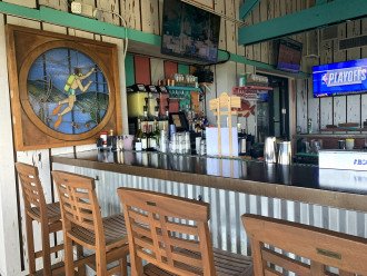 Our Beach Bar Restaurant has happy hour and music!