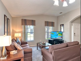 Formal living area with large TV and xbox