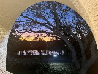 View from master bedroom and porch at sunset.