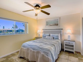 Guest bedroom queen has new furnishings and a view of Blind Pass Lagoon!